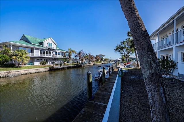 dock area with a water view