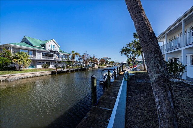 902 Gibbs Rd Unit 183, Venice, FL 34285 - dock area featuring a water view and a residential view