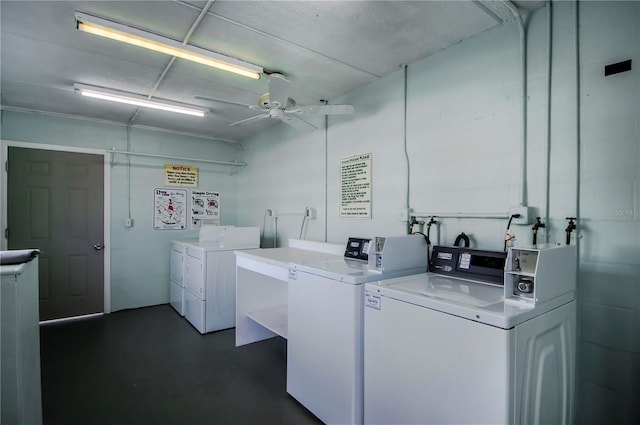 shared laundry area featuring a ceiling fan, a sink, and washing machine and clothes dryer