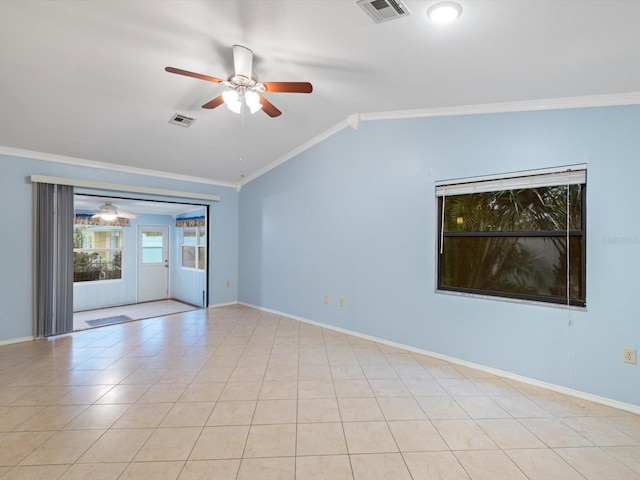 unfurnished room featuring ceiling fan, light tile patterned floors, crown molding, and vaulted ceiling