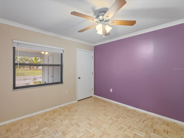 spare room with light parquet floors, ceiling fan, and crown molding