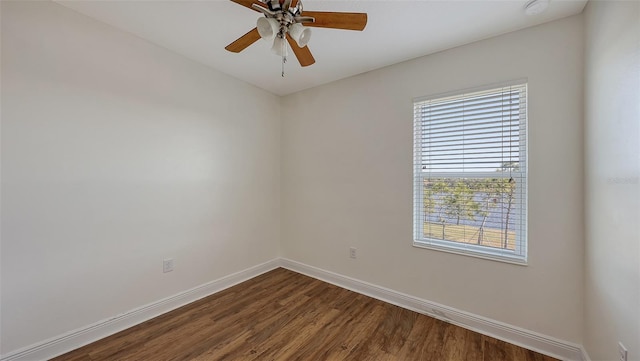 unfurnished room with hardwood / wood-style flooring and ceiling fan