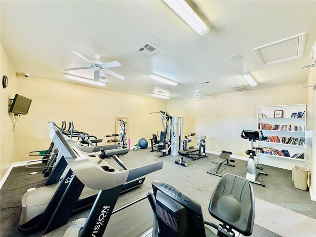 workout area with ceiling fan and carpet floors