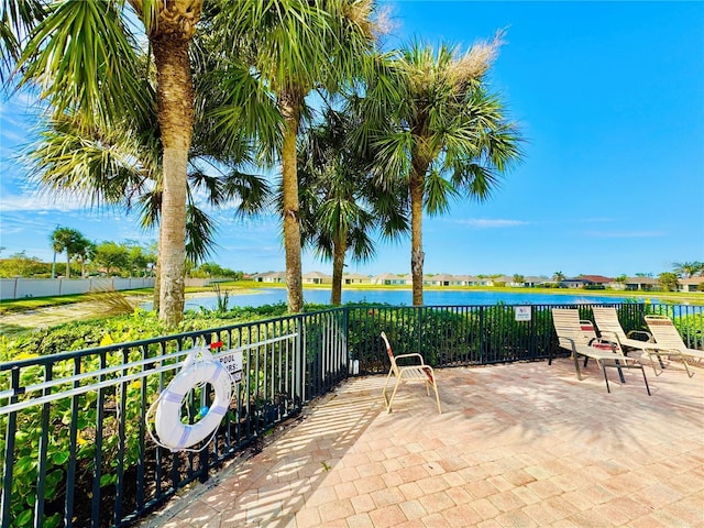 view of patio / terrace with a water view