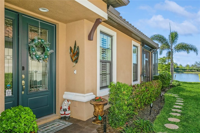 property entrance featuring a water view