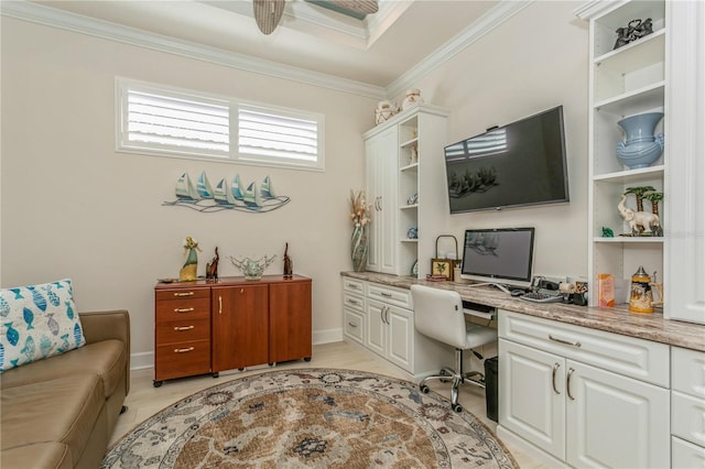 office area with built in desk and ornamental molding