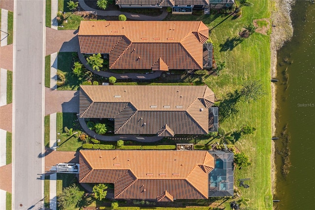 drone / aerial view featuring a water view