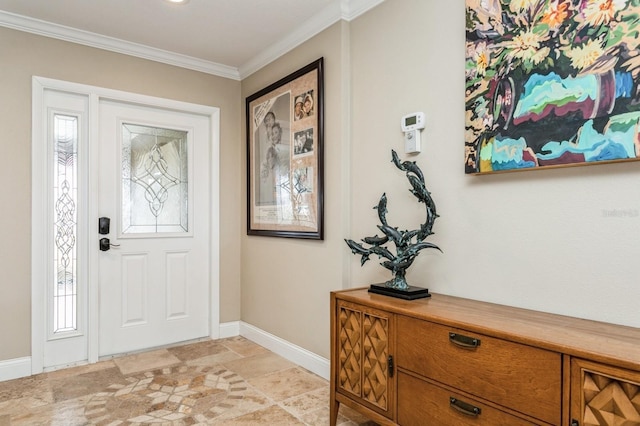 foyer entrance featuring crown molding