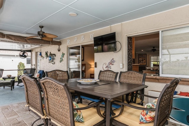 dining area with ceiling fan