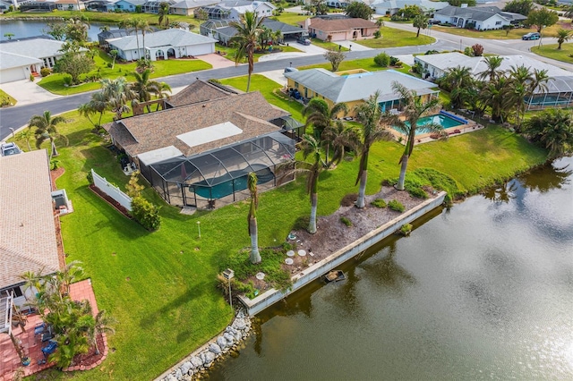 bird's eye view with a water view