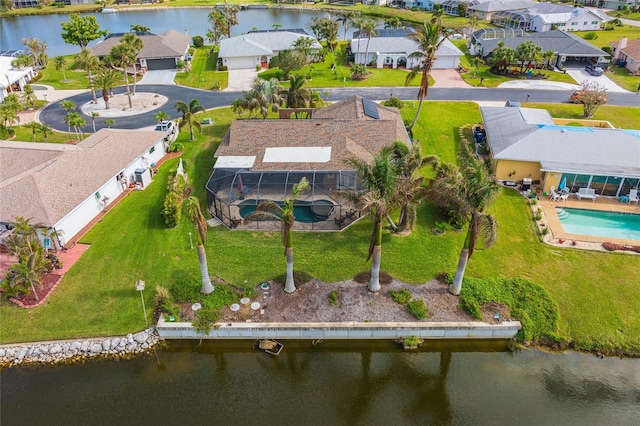 bird's eye view with a water view