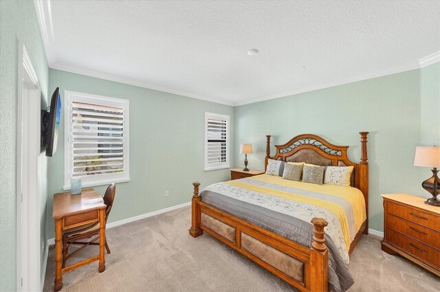 carpeted bedroom with a textured ceiling and ornamental molding