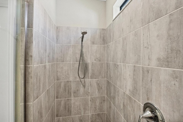 details with a tile shower