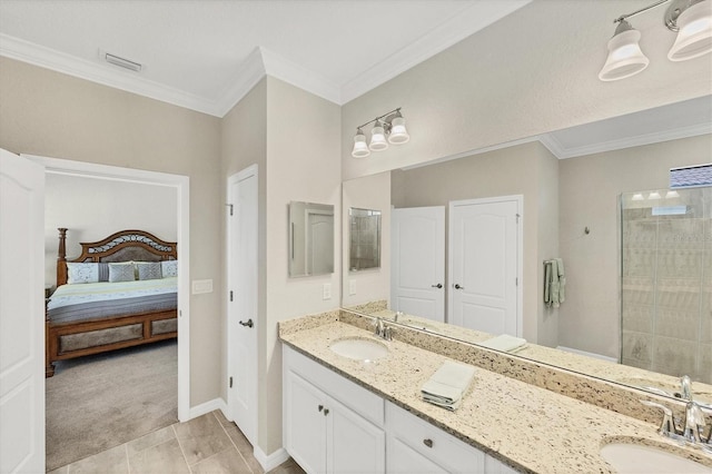 bathroom featuring vanity, crown molding, and a shower