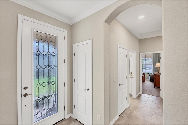 entryway with crown molding