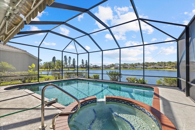 view of pool featuring a lanai, a patio area, a water view, and an in ground hot tub