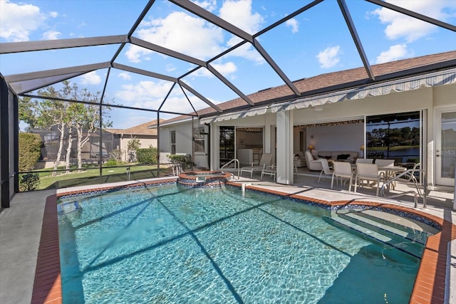 view of pool with a lanai and a patio area