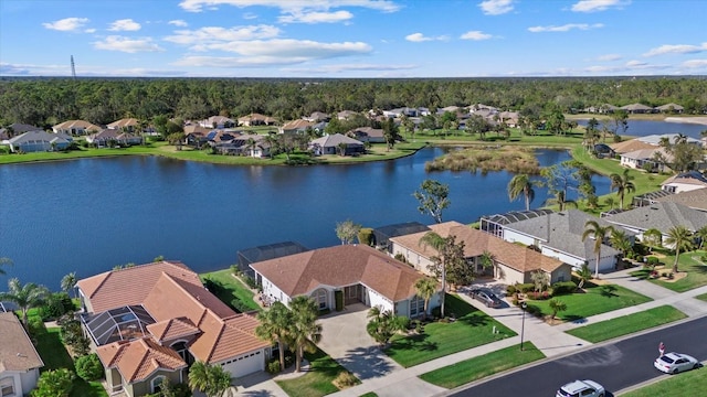 birds eye view of property with a water view