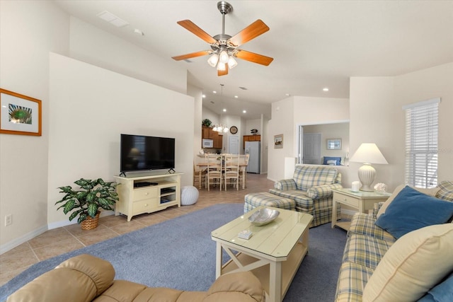 living room featuring ceiling fan, tile patterned flooring, and high vaulted ceiling