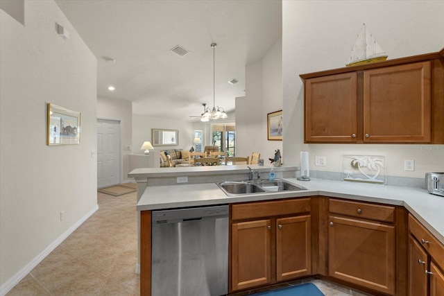 kitchen with ceiling fan with notable chandelier, sink, hanging light fixtures, stainless steel dishwasher, and kitchen peninsula