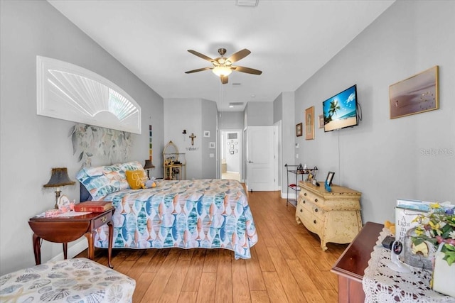 bedroom featuring ceiling fan and light wood-type flooring