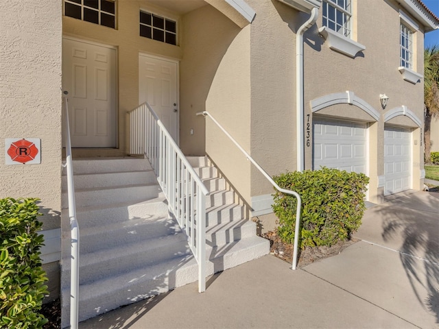 property entrance with a garage