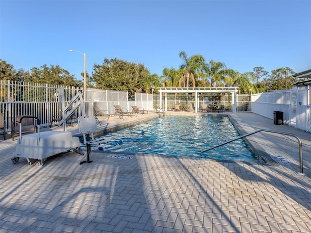 view of pool featuring a patio area