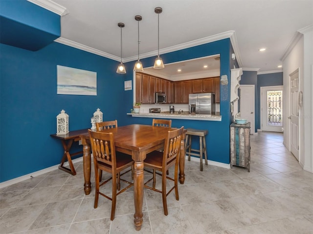 dining space with crown molding