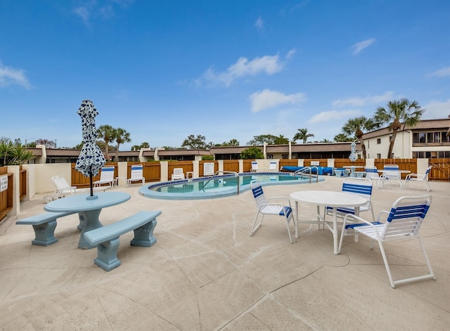1708 Bonitas Cir Unit 1726A, Venice, FL 34293 - community pool featuring a patio area