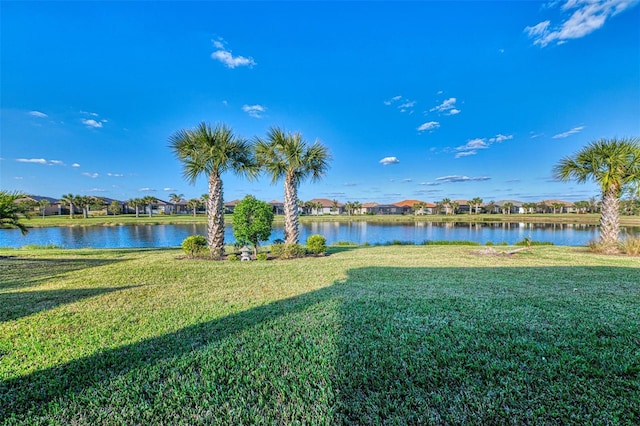 view of yard with a water view