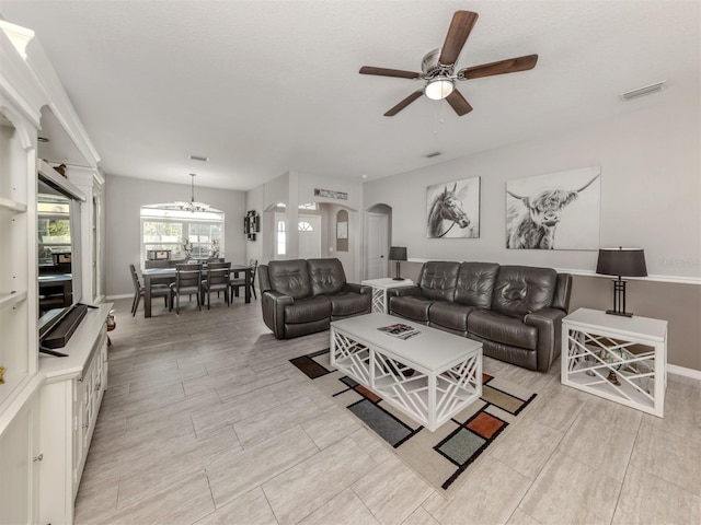 living room with ceiling fan