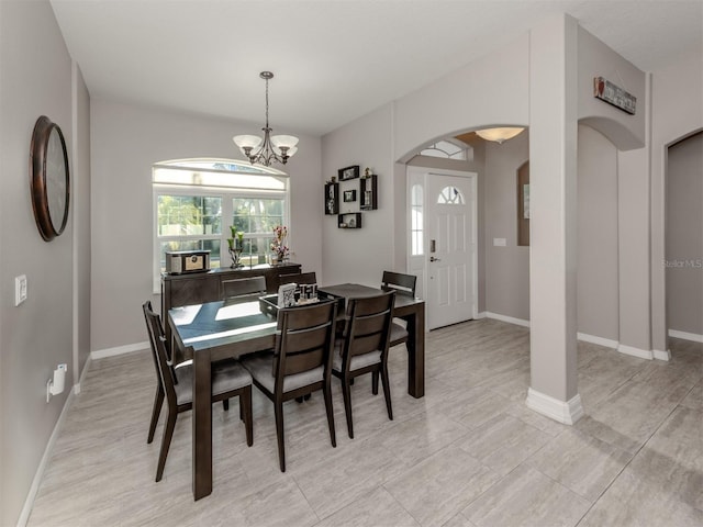 dining room featuring an inviting chandelier