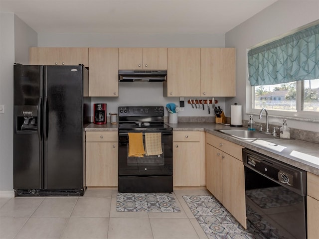 kitchen with light brown cabinetry, sink, light tile patterned floors, and black appliances