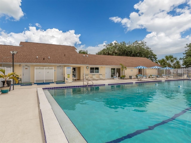 view of swimming pool with a patio