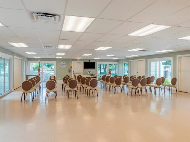 misc room with a paneled ceiling