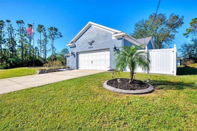 view of home's exterior featuring a lawn and a garage