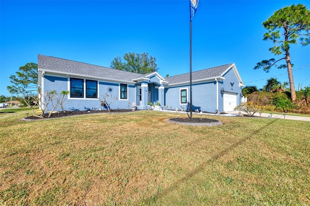 ranch-style house with a front yard and a garage