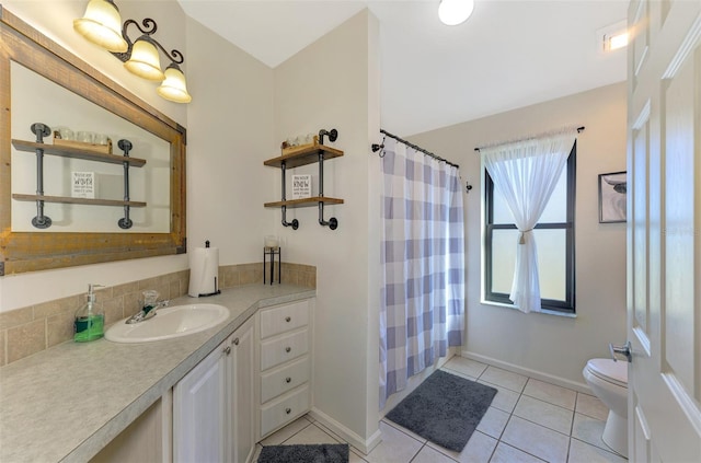 bathroom featuring tile patterned flooring, vanity, toilet, and a shower with shower curtain