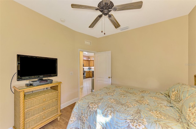 bedroom with ceiling fan and hardwood / wood-style floors