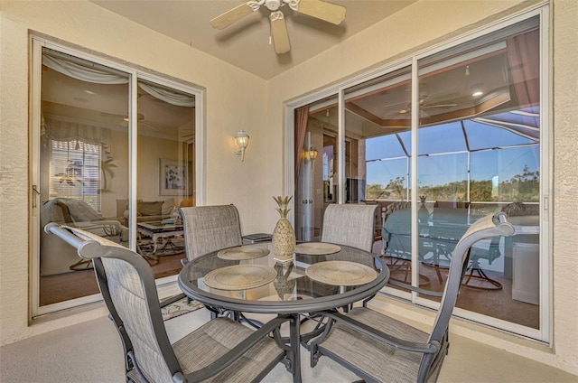 sunroom / solarium with ceiling fan