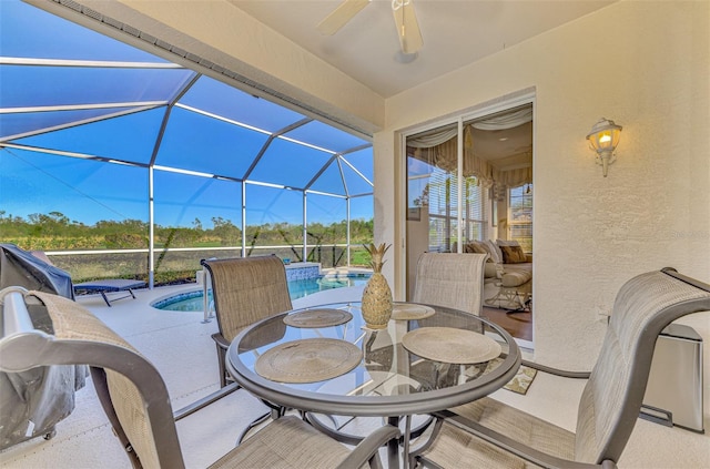 view of patio with glass enclosure