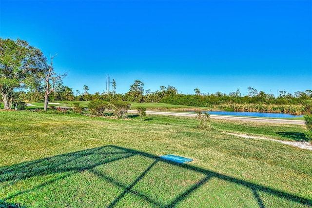 view of yard with a water view