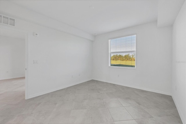 view of tiled empty room