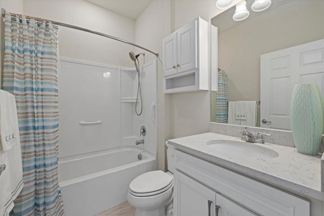 full bathroom featuring vanity, shower / bath combination with curtain, and toilet