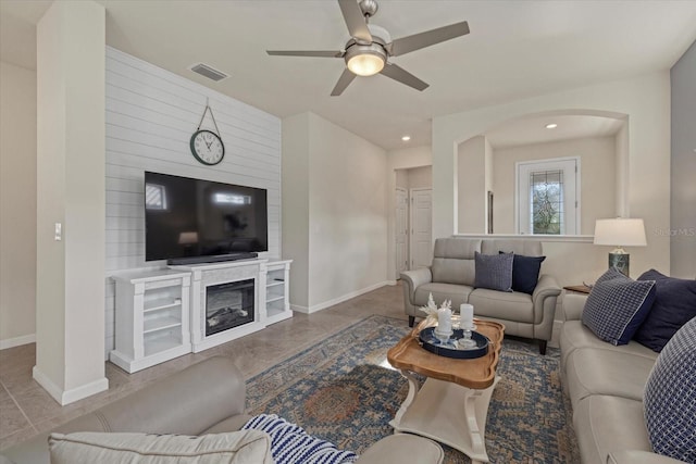 living room with ceiling fan