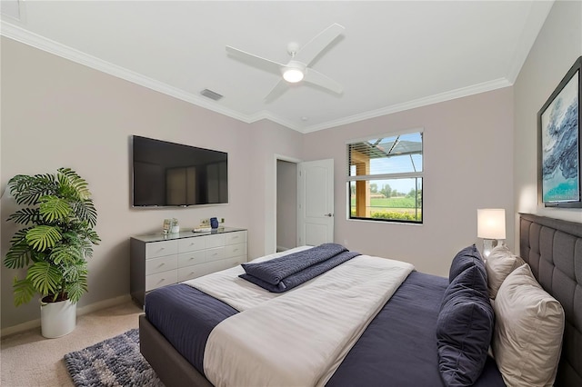 bedroom featuring visible vents, baseboards, crown molding, and carpet