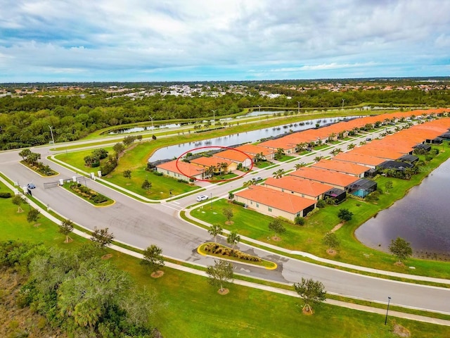 aerial view featuring a residential view and a water view