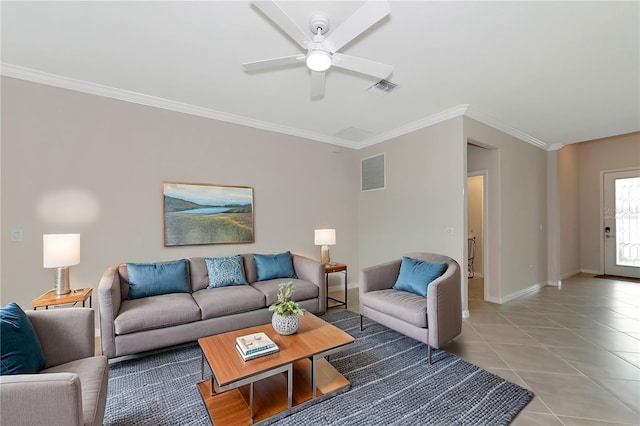 living area featuring light tile patterned floors, visible vents, and ornamental molding