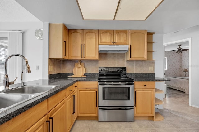 kitchen with electric stove, ceiling fan, sink, and light brown cabinetry