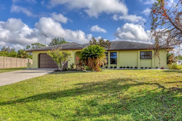 single story home featuring a garage and a front yard